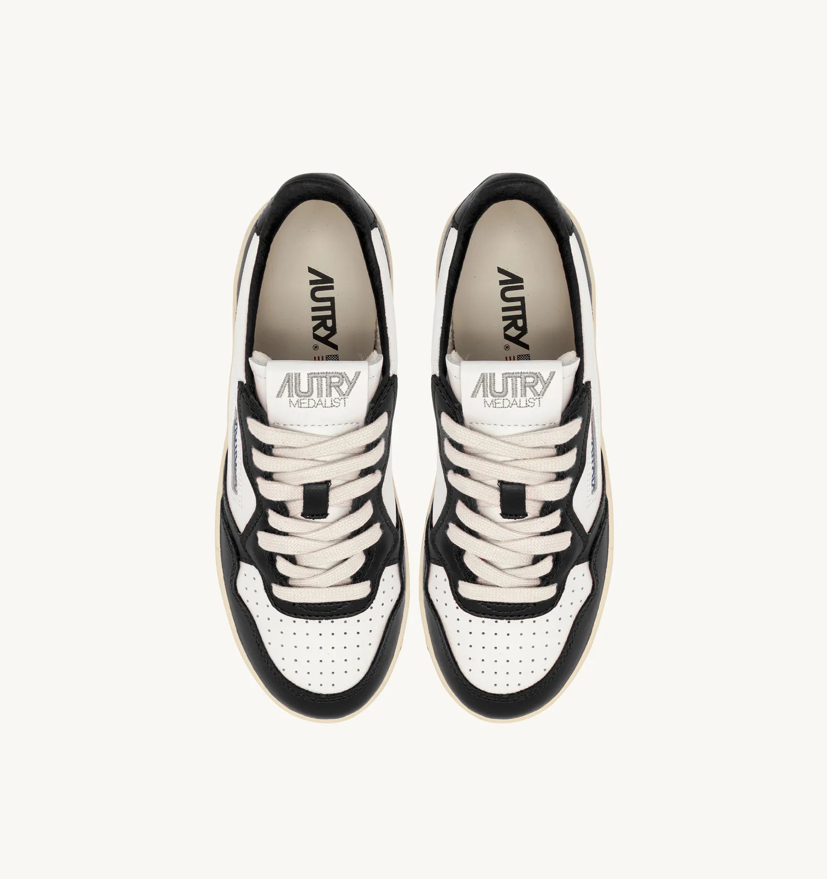 AUTRY NEW ARRIVALS WOMAN WOMAN  MEDALIST PLATFORM SNEAKERS IN WHITE AND BLACK LEATHER